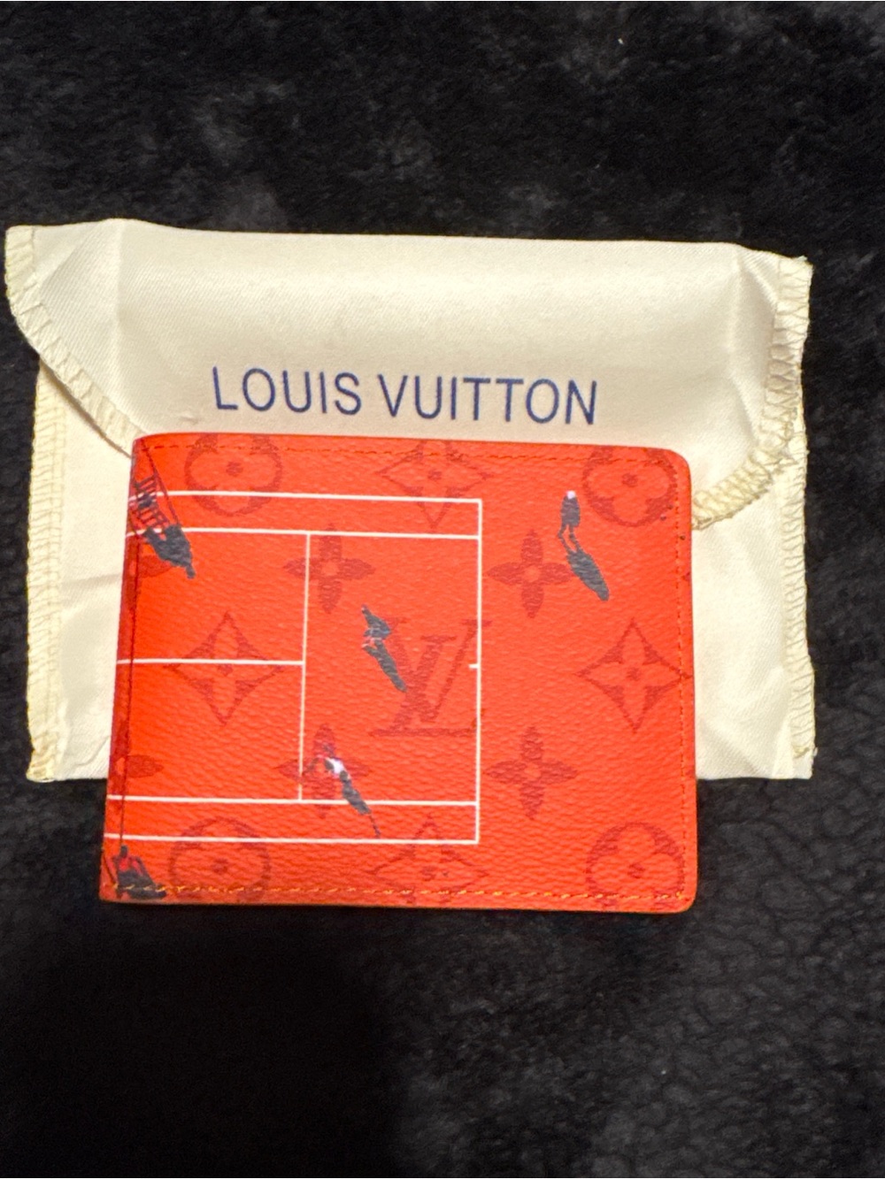 Louis Vuitton Orange Textured Leather Bifold Wallet